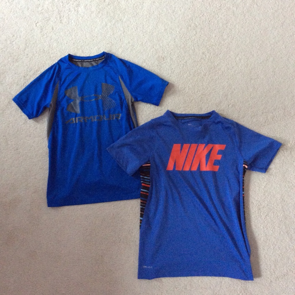 A bundle of a Nike shirt and an under armor shirt